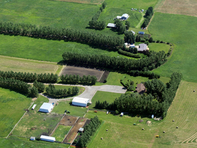 The farm where Douglas Garland lived with his parents in a photo taken on July 7, 2014, when Garland was a “person of interest” in the murder of Kathy and Alvin Liknes and their five-year-old grandson.