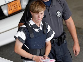 Dylann Roof is escorted from the Cleveland County Courthouse in Shelby, N.C., in a June 18, 2015, file photo.