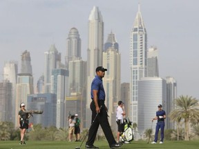 Tiger Woods plays on the 13th hole during the 1st round of the Dubai Desert Classic golf tournament, in Dubai, United Arab Emirates, Thursday, Feb. 2, 2017.