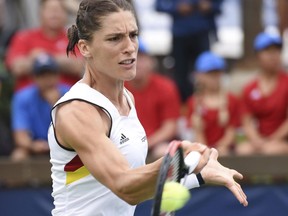 Germany's Andrea Petkovic returns a ball to the United States' Alison Riske in a Fed Cup quarterfinal in Lahaina, Hawaii, on Feb. 11.