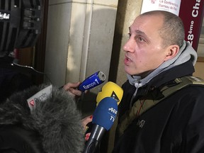 Chief suspect is Vjeran Tomic arrives at his trial in Paris, Monday Jan. 30, 2017. Three people, including Tomic, are on trial, accused of involvement in one of the world's biggest art heists, a dramatic 2010 theft of more than $100 million worth of artworks from the Paris Museum of Modern Art _ including a Picasso, a Matisse and other masterpieces.