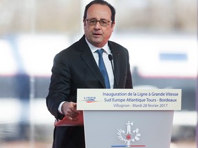 French President Francois Hollande delivers a speech as he attends the inauguration of the new "Sud Europe Atlantique"  high-speed rail line, linking Tours and Bordeaux, on February 28, 2017, in Villognon, central France.
