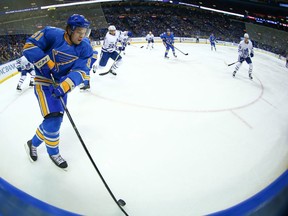 Vladimir Tarasenko of the St. Louis Blues prepares to face two Toronto Maple Leafs players (Getty Images)