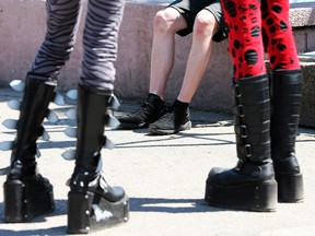 Gothic enthusiasts take a break during the annual Wave-Gotik-Treffen music festival on May 26, 2012 in Leipzig, Germany.