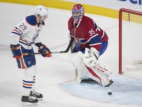 Edmonton Oilers forward Leon Draisaitl (left) scores against Montreal Canadiens goaltender Al Montoya in a shootout on Feb. 5.