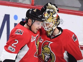 Ottawa Senators defenceman Dion Phaneuf (left) congratulates goaltender Mike Condon after a shutout win over the Washington Capitals on Jan. 24.