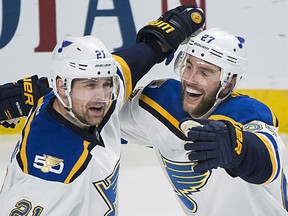 Patrik Berglund, left, celebrates with St. Louis Blues teammate defenceman Alex Pietrangelo after scoring against the Canadiens during second period action in Montreal on Saturday night.