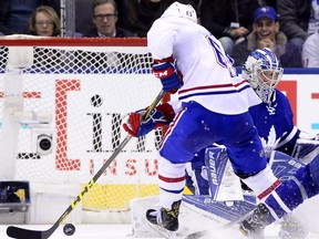 Montreal Canadiens' Andrew Shaw scores the game-winning overtime goal against Maple Leafs netminder Frederik Andersen during their game in Toronto on Saturday.