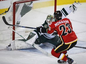 Minnesota Wild goalie Devan Dubnyk lets in a goal from Calgary Flames centre Sean Monahan during the first period in Calgary on Wednesday.