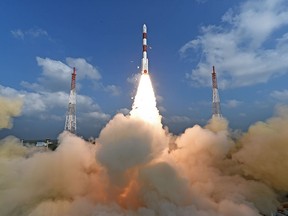 This photograph released by the Indian Space Research Organization shows its polar satellite launch vehicle lifting off from a launch pad at the Satish Dhawan Space Centre in Sriharikota, India, on Feb.15, 2017.