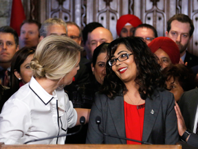 Liberal MP Iqra Khalid is congratulated by colleagues as she speaks about her anti-Islamophobia motion on Feb. 15, 2017.