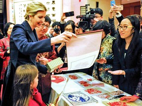 Ivanka Trump attends the Chinese Embassy's New Year reception with her daughter Arabella (front L) in Washington, D.C., the United States, Feb. 1, 2017.