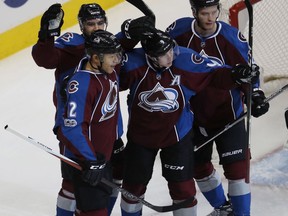 Jarome Iginla,left, celebrates scoring a goal with Avalanche teammates Matt Nieto, Matt Duchene and Mikhail Grigorenko,against the Winnipeg Jets in their game Saturday night in Denver.