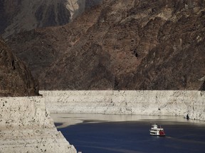 In this Oct. 14, 2015, file photo, a riverboat glides through Lake Mead on the Colorado River