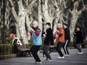 People practice Tai Chi at Fuxing Park in Shanghai, China, on Feb. 9, 2016