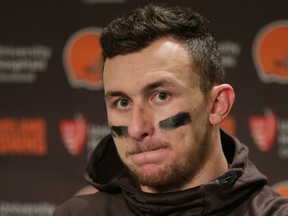 Former Cleveland Browns quarterback Johnny Manziel speaks to reporters in this 2015 file photo.