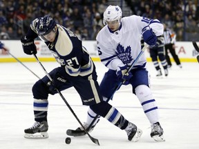 Toronto Maple Leafs forward Mitch Marner (right) was injured in this Feb. 15 game against the Columbus Blue Jackets.