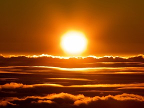 Park officials say the sunrise on Haleakala attracts over a thousand people a day, resulting in an overload of visitors and creating a safety hazard.