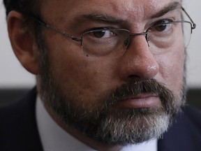 FILE - In this Jan. 24, 2017 file photo, Mexico's Foreign Relations Secretary Luis Videgaray pauses during a press conference, in Mexico City. Mexico's top diplomat said Monday, Jan. 30, 2017, his country will spend about $50 million to hire lawyers for migrants in the United States facing deportation. Videgaray said the effort "isn't about obstructing the enforcement of the law in the United States, or much less opposing law enforcement." (AP Photo/Rebecca Blackwell, File) ORG XMIT: XLAT102