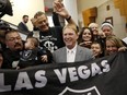 In this April 28, 2016, file photo, Oakland Raiders owner Mark Davis (centfd) meets with fans after speaking at a meeting of the Southern Nevada Tourism Infrastructure Committee in Las Vegas.