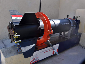 Iraq's Military Industries Company posted photos of an engine test of a new missile. A Canadian company is investigating why its logo is on the base.