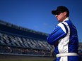 D.J. Kennington watches qualifying for the Daytona 500 on Feb. 19.