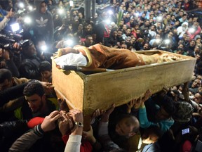 Mourners carry the coffin of Omar Abdel Rahman during his funeral in the village of Jamalia, in the Egyptian province of Dakahlia, on February 22, 2017.