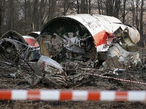 This is a Sunday, April 11, 2010 file photo of the wreckage of the Polish presidential plane which crashed early Saturday in Smolensk, western Russia.  A Polish court  Tuesday June 21, 2016 has convicted and handed a suspended prison term to Pawel Bielawny a former deputy head of government security over the 2010 plane crash that killed President Lech Kaczynski and 95 others.