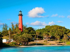 Energetic visitors who climb to the top of the landmark red lighthouse at Jupiter Inlet are rewarded with an excellent view.