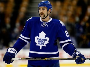 In this Nov. 12, 2014 file photo, then-Toronto Maple Leafs forward Daniel Winnik skates in warm-up at the Air Canada Centre.