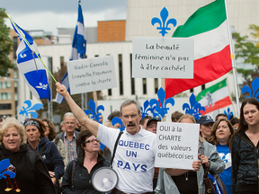 Supporters of a proposed Quebec values charter march in Montreal in 2013. The charter would have banned the wearing of religious symbols and clothing from public institutions.