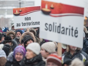 Several hundred people march in solidarity for the victims of the mosque shooting in Quebec City, on Feb. 5, 2017.