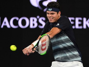 Milos Raonic of Thornhill, Ont. returns a shot during a recent tournament. The development of Raonic into the No. 3 ranked player in the world rankings has helped generate a tennis boom for Canadian youth. The participation numbers have increased in record numbers, partly attributal to the success of Raonic and Montreal's Eugenie Bouchard, who currently holds down the No. 47 among the women.