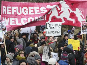 Trump's immigration policy brings out thousands of demonstrators to protest in front of the U.S. Embassy in Toronto on Feb. 4, 2017.