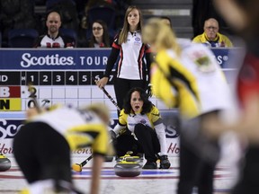 Manitoba skip Michelle Englot calls the sweep as Ontario skip Rachel Holman watches during the Page 1-2 playoff at the Scotties Tournament of Hearts in St. Catharines, Ont., on Friday.