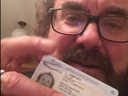Camrose man Dave Balay  shows the cracked driver's license that yielded him a $465 ticket. A witness now says there was much more behind the ticket than just a crack. 