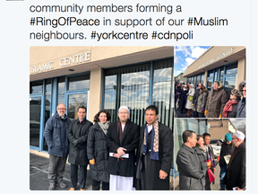 York Centre MP Michael Levitt (second from left in large photo) and Jason Pippin (second from right) outside the Imdadul Islamic Centre on Friday.