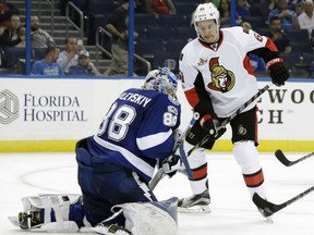 Mark Stone of the Ottawa Senators looks for a rebound in front of Lightning goalie Andrei Vasilevskiy during the third period of their game Thursday night in Tampa, Fla. Stone had two goals in the Senators' 5-2 win.