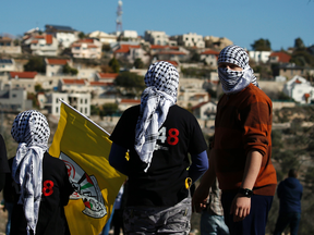 Palestinian protestors facing the Israeli settlement of Qadumim in the West Bank, Dec. 30, 2016.