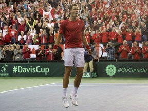 Canada's Vasek Pospisil celebrates after beating Great Britain's Kyle Edmund during World Group first round Davis Cup tennis action in Ottawa in February.