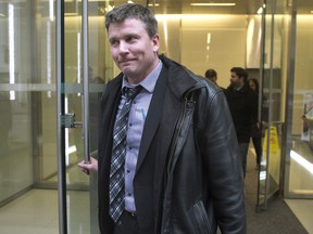 High school teacher Timothy C. Sullivan leaves a disciplinary hearing in Toronto, on Tuesday Feb. 21.