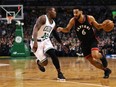 Toronto Raptors guard Cory Joseph (right) drives against Boston Celtics guard Terry Rozier on Feb. 1.