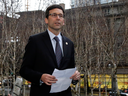 Washington Attorney General Bob Ferguson arrives to talk to reporters, following a hearing in federal court Friday, Feb. 3, 2017, in Seattle.