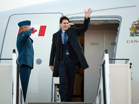 Prime Minister Justin Trudeau arrives at the airport in Berlin for a three-day visit to Germany, on Feb. 16, 2017.