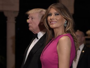 President Donald Trump and first lady Melania Trump arrive for the 60th annual Red Cross Gala at Trump's Mar-a-Lago resort in Palm Beach, Fla., Saturday, Feb. 4, 2017.