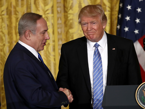Israeli Prime Minister Benjamin Netanyahu and U.S. President Donald Trump shake hands following a news conference at the White House on Feb. 15, 2017.
