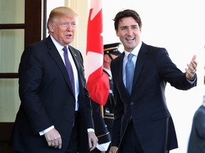 President Donald Trump greets Canadian Prime Minister Justin Trudeau upon his arrival at the White House in Washington, Monday, Feb. 13, 2017