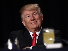 U.S. President Donald Trump, smiles while being introduced during the National Prayer Breakfast in Washington, D.C., U.S., on Thursday, Feb. 2, 2017.