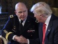 President Donald Trump, right, shakes hands with Army Lt. Gen. H.R. McMaster, left, at Trump's Mar-a-Lago estate in Palm Beach, Fla., Monday, Feb. 20, 2017, where he announced that McMaster will be the new national security adviser.