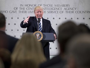 In this Jan. 21, 2017, photo, President Donald Trump speaks at the Central Intelligence Agency in Langley, Va. A CIA analyst who resigned over Trump's presidency said he did so in part because of the disrespect the new president showed during this appearance.